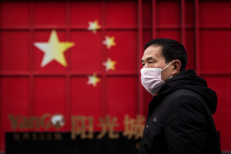 A Man Wearing Mask in Wuhan, China A Man Wearing Mask in Wuhan, China