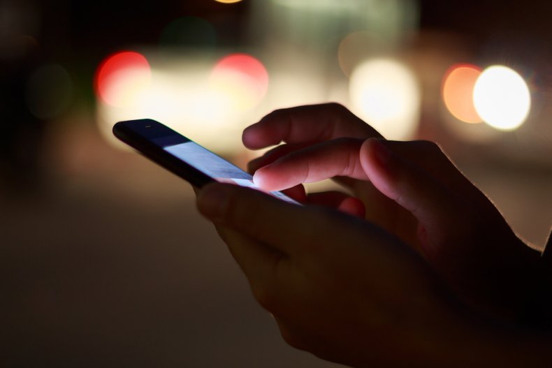 Person using smartphone (stock)