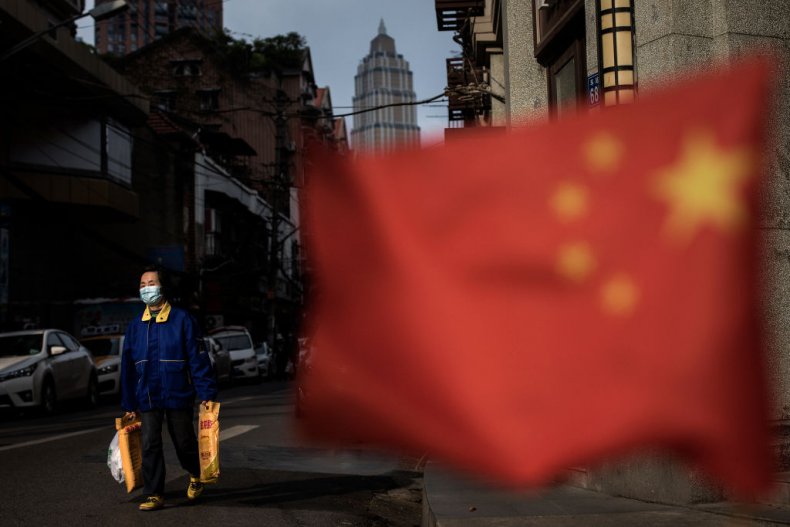 Wuhan Resident Comes Out of Market