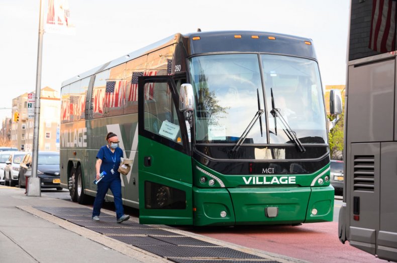 Bus Waits to Transport Medical Staff Coronavirus