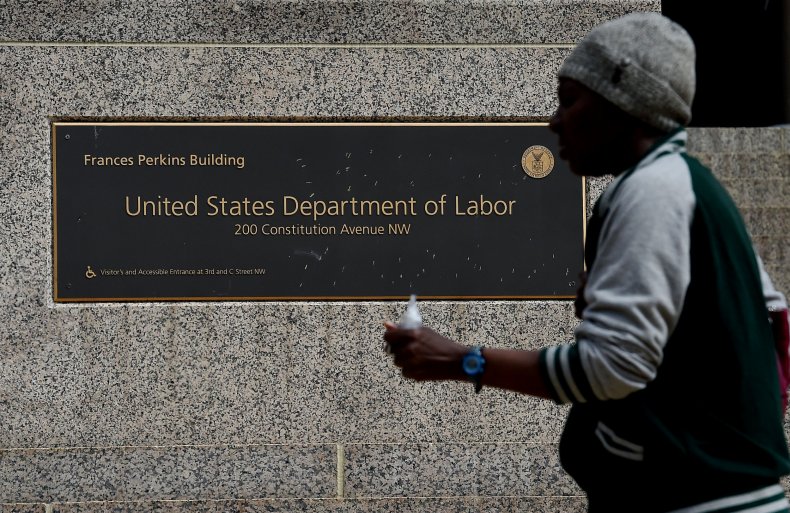 Man Walks Past Department of Labor