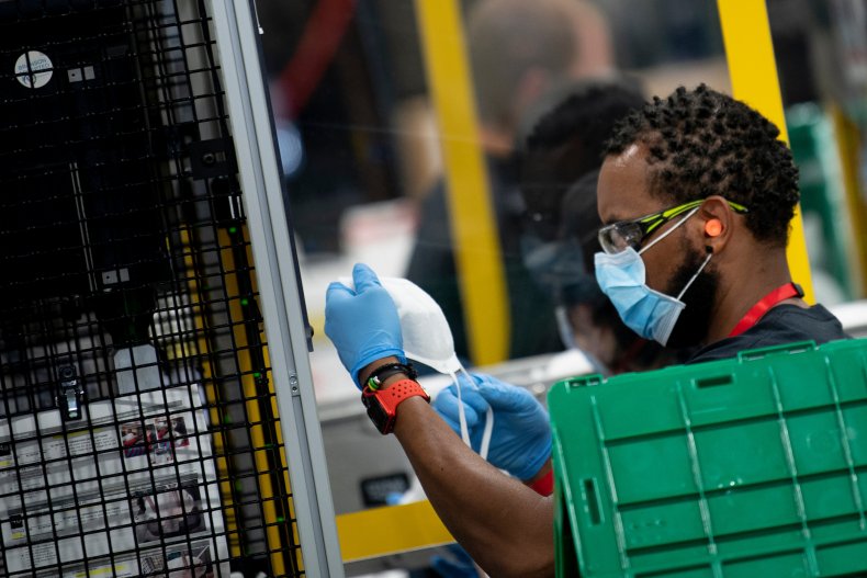 A worker at a Honeywell mask factory works on N95 masks May 5, 2020, in Phoenix, Arizona.