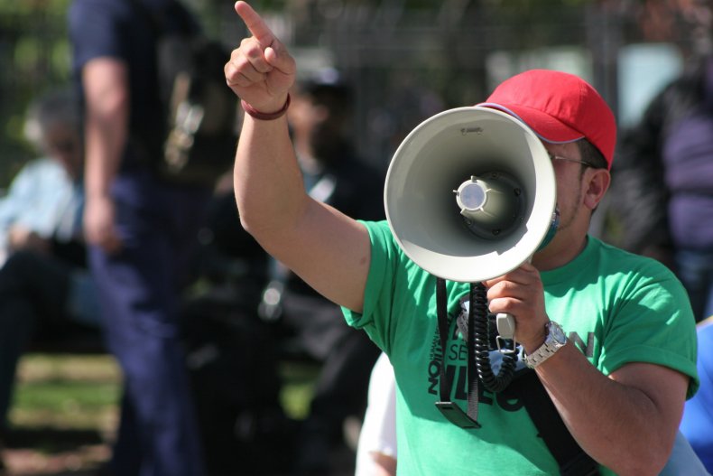 protestor with bullhorn protestor with bullhorn