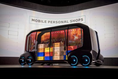 A judge's gavel resting on a pile of one-dollar bills