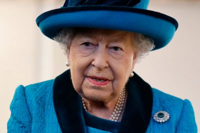 Queen Elizabeth II Visits Royal Philatelic Society