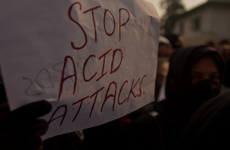 Acid attack protest sign