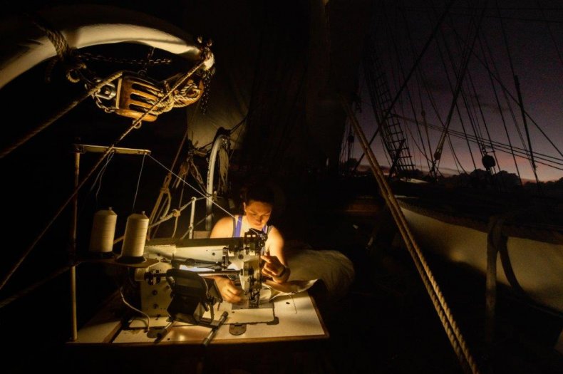 Bark Europa crew at work at night