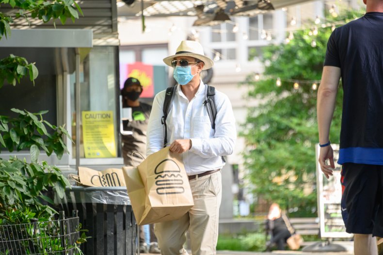 Man wears protective masks New York restaurant