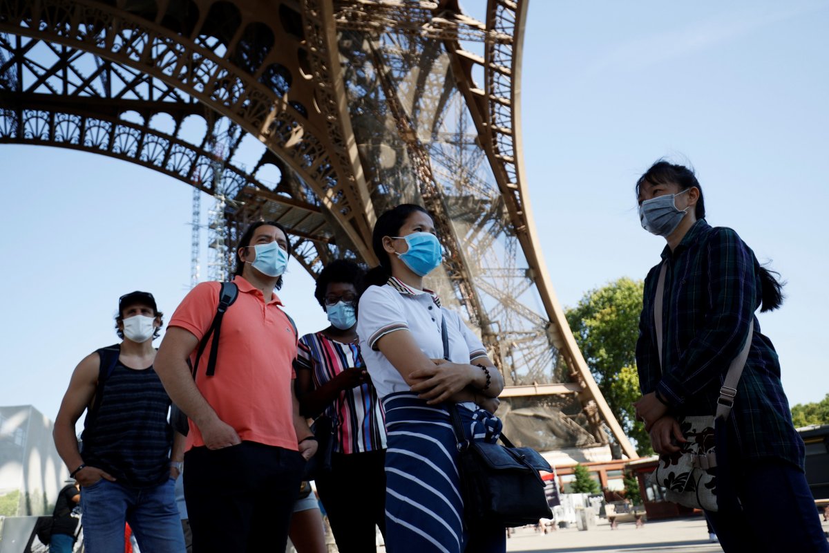 Visitors wear face masks in Paris