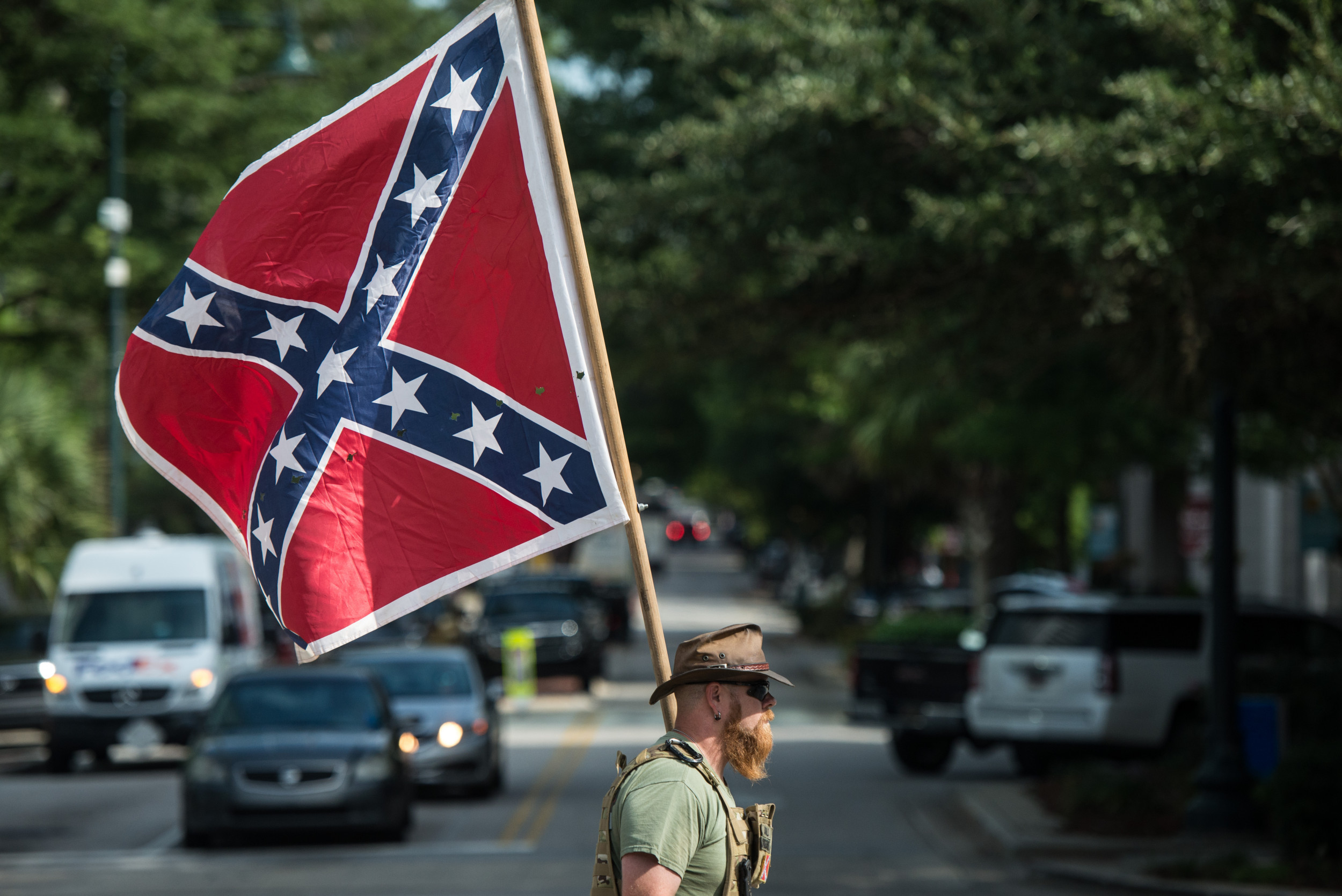 A member of the Sons of Confederate Veterans said: "Take down our ...