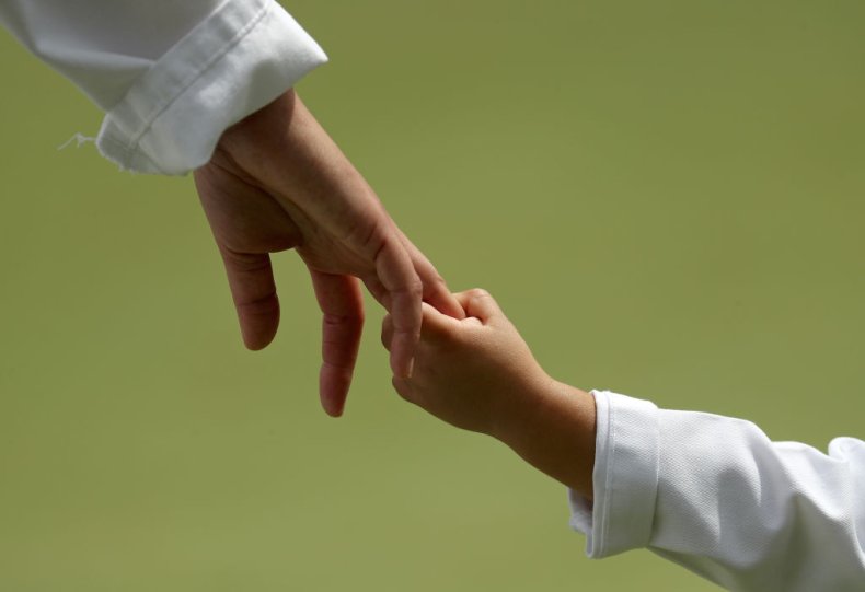 Holding hands.