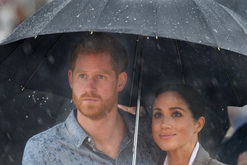 Prince Harry and Meghan Markle in Rain