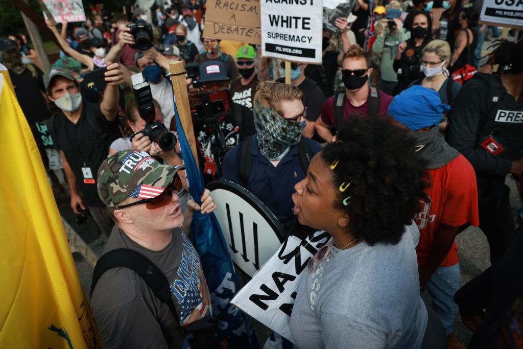 Police Intervene as Far-Right Protesters and Counter Demonstrators ...