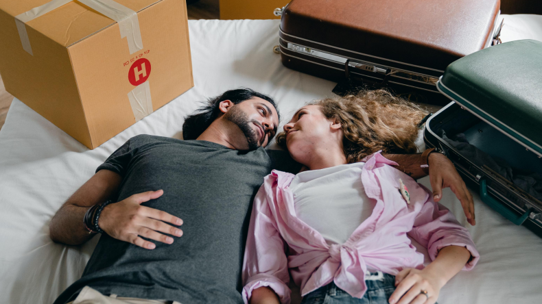 Couple unpacking or packing up