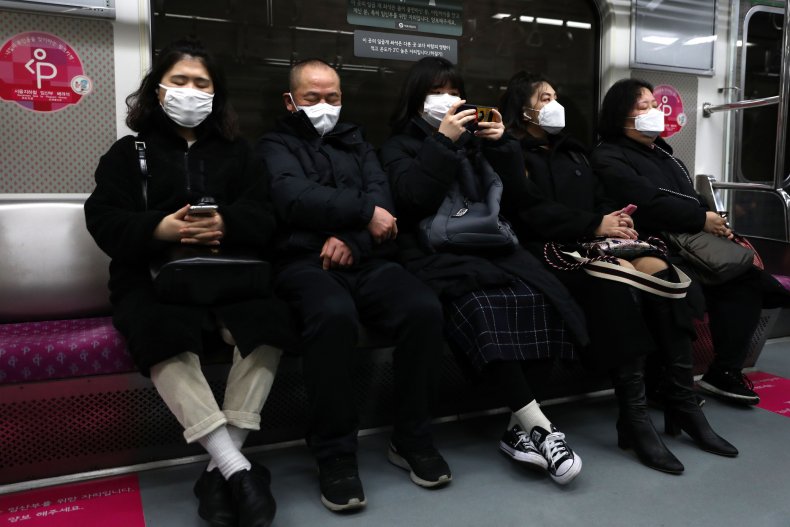 Seoul South Korea subway masked passengers
