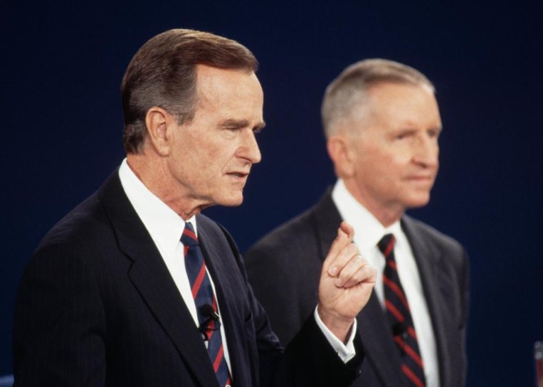 1992: President George H.W. Bush checks his watch