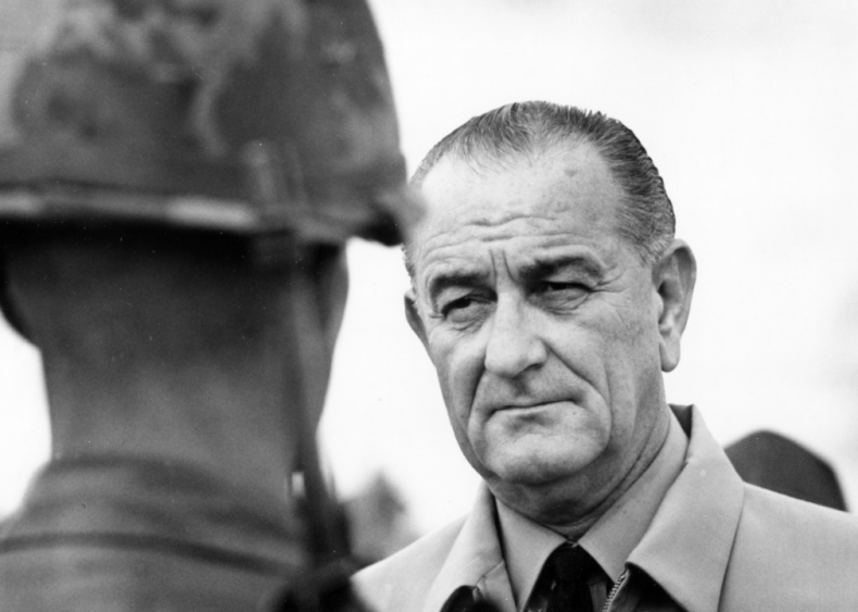 1966: President Johnson inspects a marine