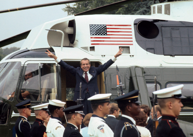 1974: Richard Nixon giving victory sign after resignation