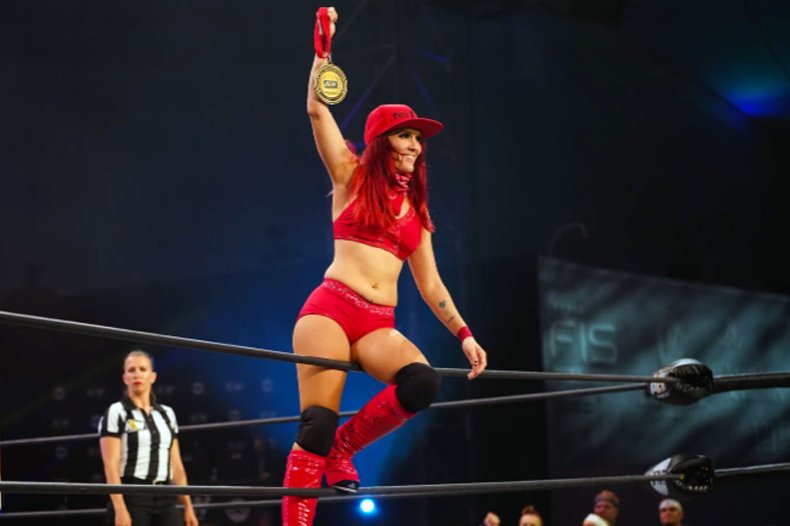 aew ivelisse womens tag team cup medal
