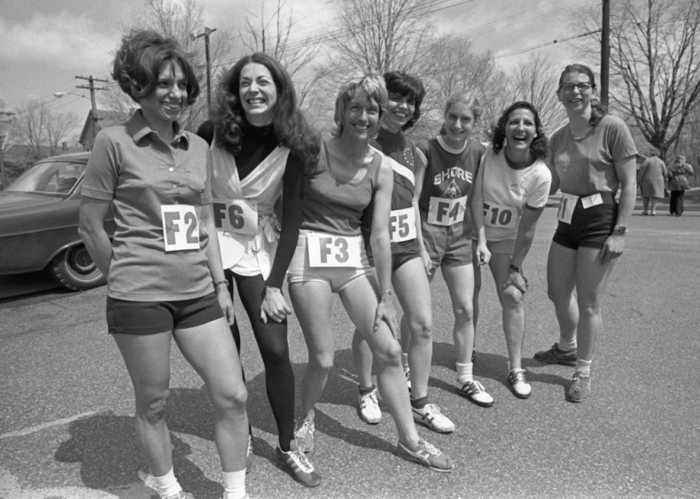 Women run the Boston Marathon in men’s sneakers
