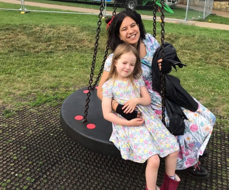 Mother and daughter on swing