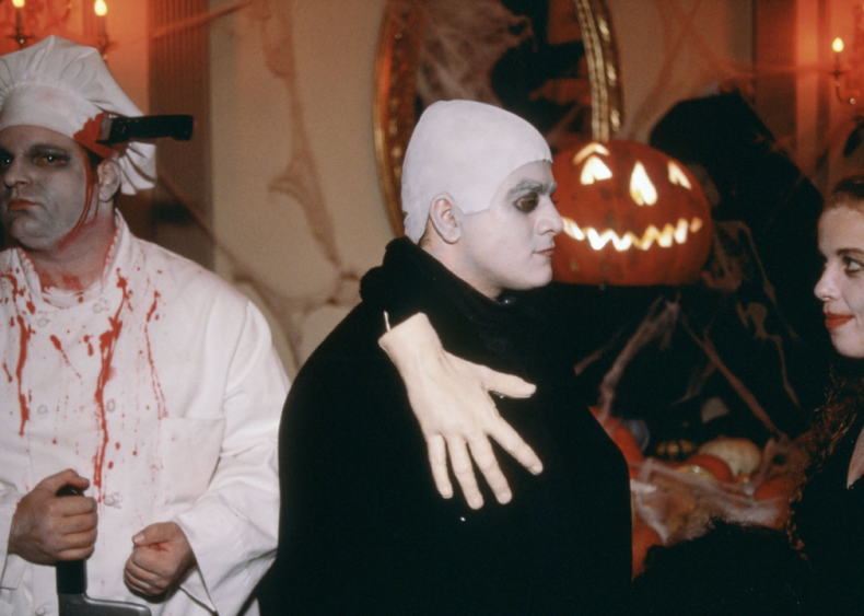 A chef and Uncle Fester with Thing A chef and Uncle Fester with Thing