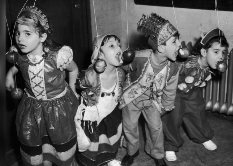 1900–1920s: Halloween popularity drives mass-produced costumes
