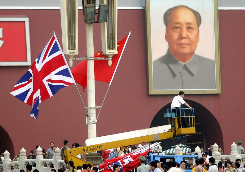 China UK Mao conservativesA worker puts up
