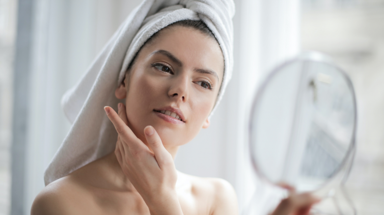 Woman Looking at a Mirror Woman Looking at a Mirror