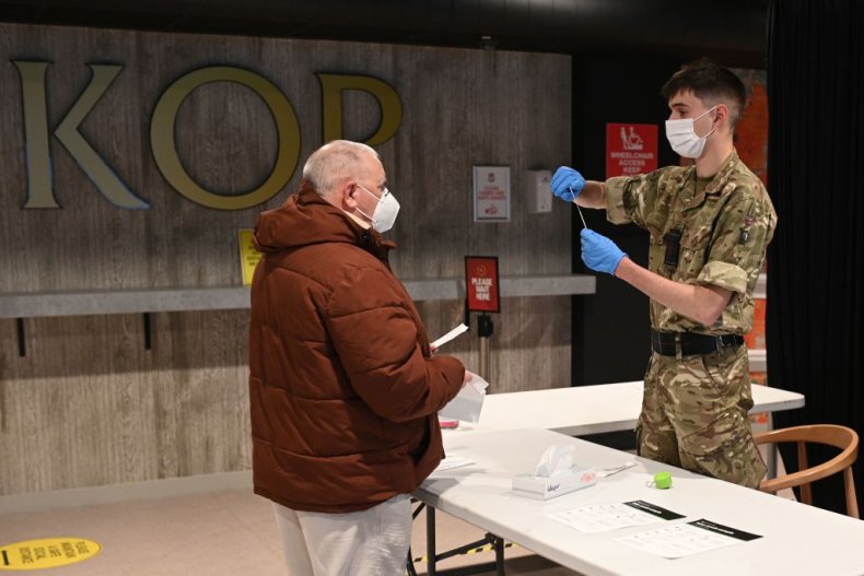 Army officer delivers COVID test