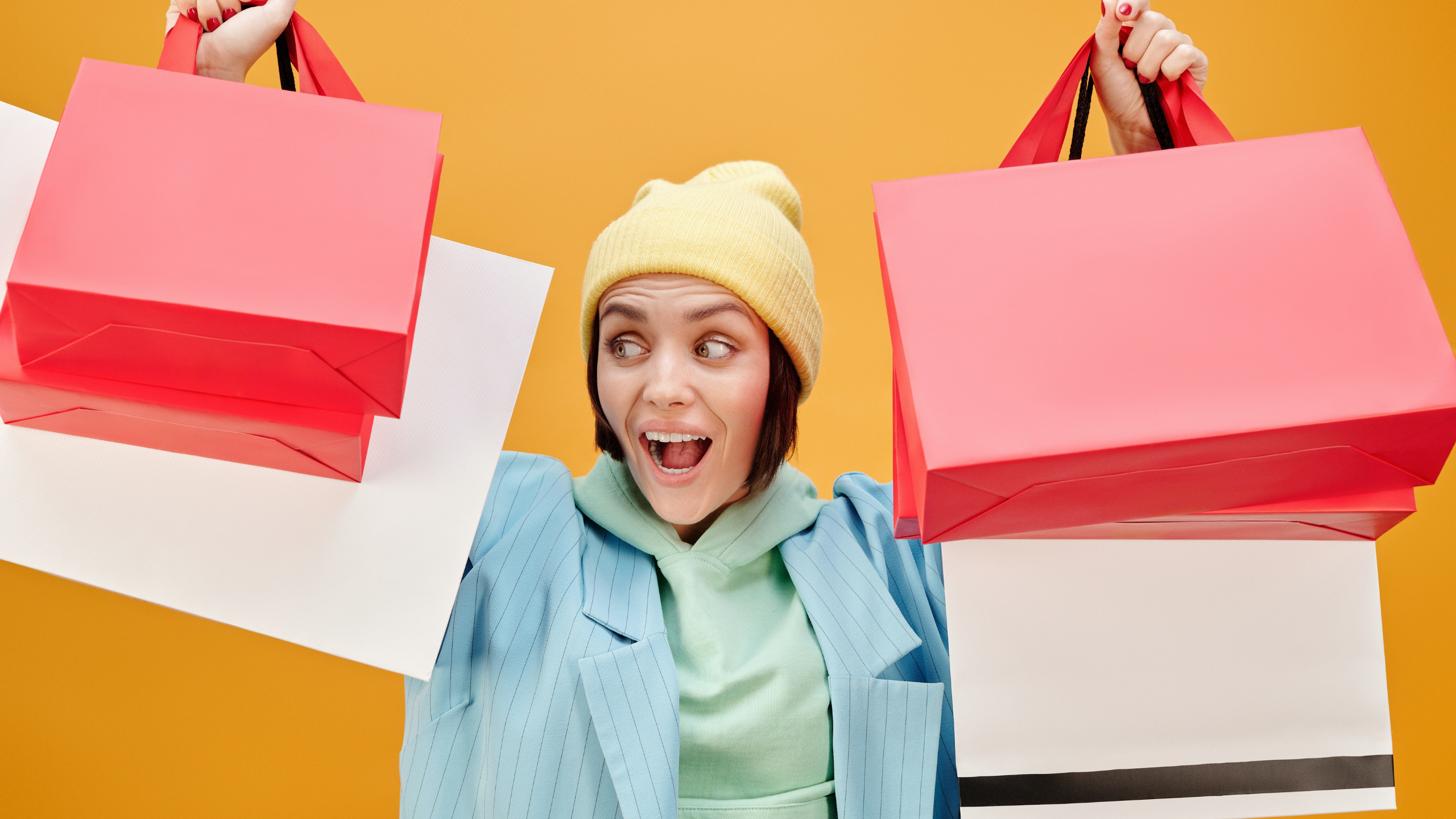 https://d.newsweek.com/en/full/1670867/girl-holding-shopping-bags.png