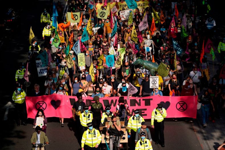 Extinction Rebellion activists march through London