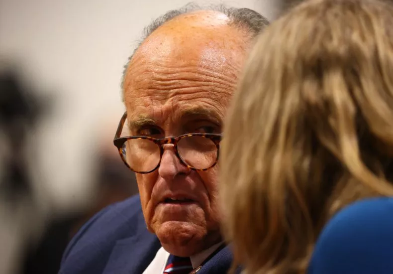 Rudy Giuliani Tells Alleged Voter Fraud Witness to 'Shush' in Viral Video Watched Over 7 Million Times