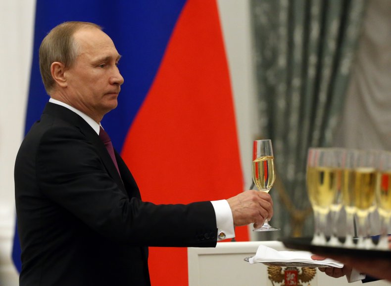 Russian President Vladimir Putin with champagne