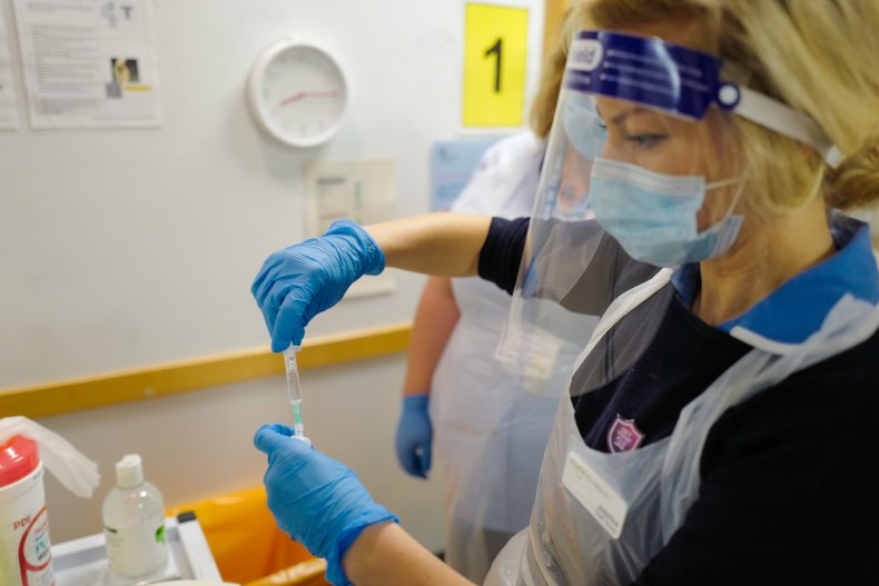 Nurse administers Pfizer/BioNTech COVID-19 vaccine