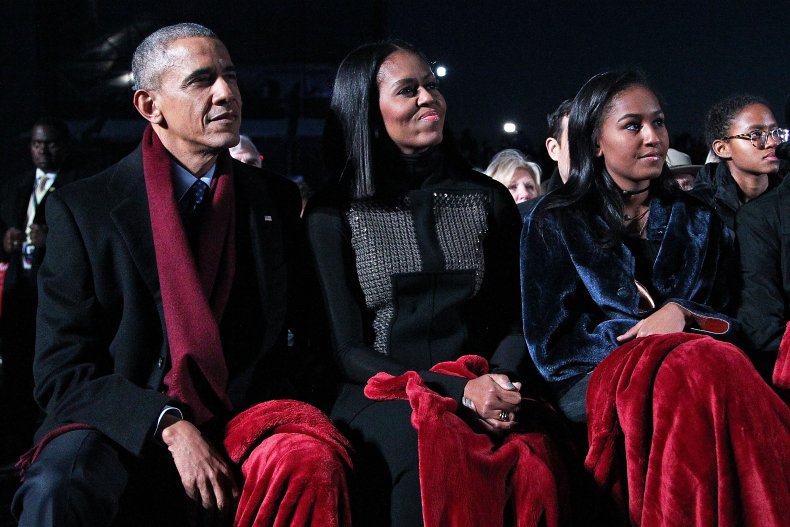 Sasha Obama with her parents