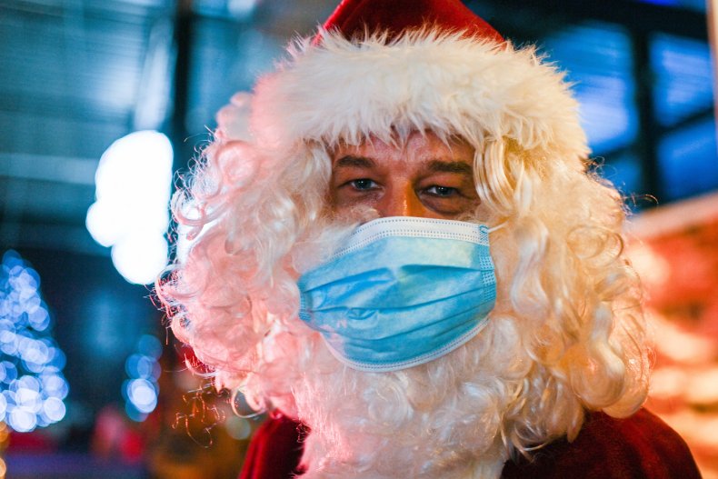 GERMANY-CHRISTMAS-HEALTH-VIRUS A man dressed as Santa Claus 