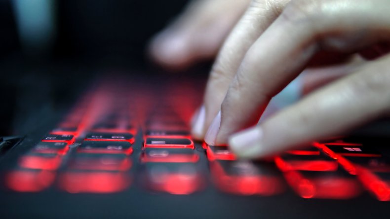 Fingers typing on a computer keyboard