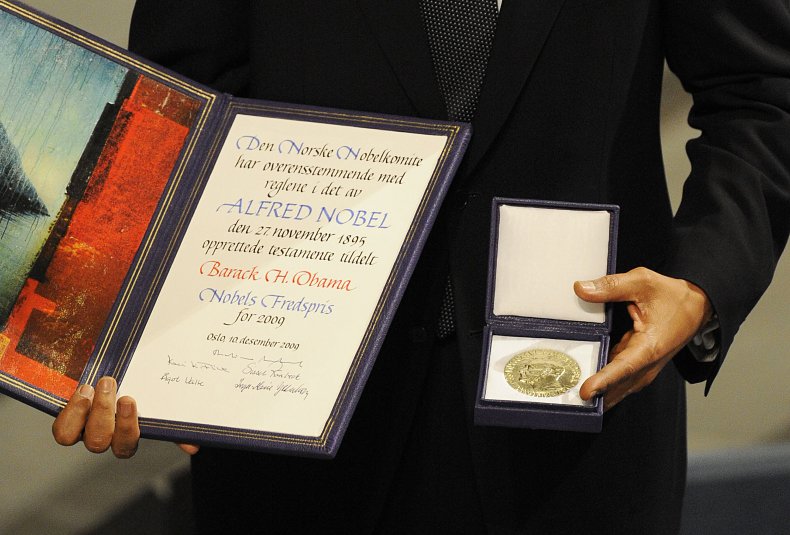 Barack Obama Poses with His Nobel Prize