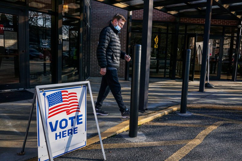 Voter leaves polling station Georgia runoffs