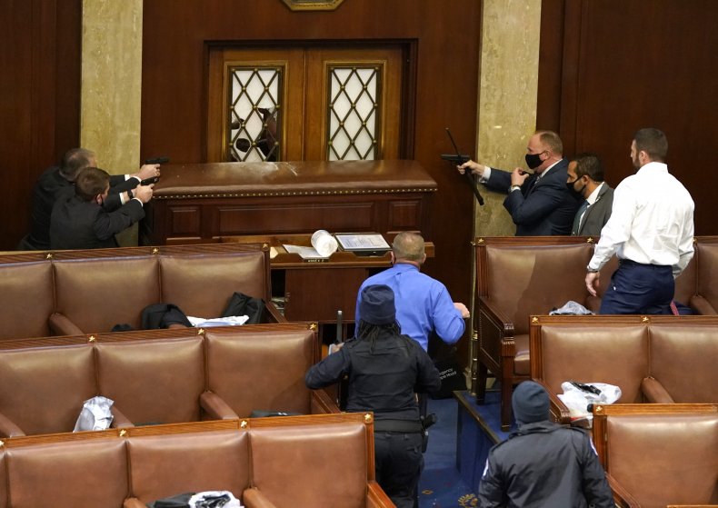 Guns Drawn by Police in Residence Chamber as Trump Mob Usually takes About Capitol