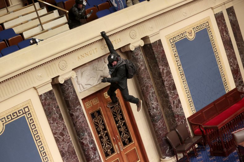 Capitol breached with armed standoff