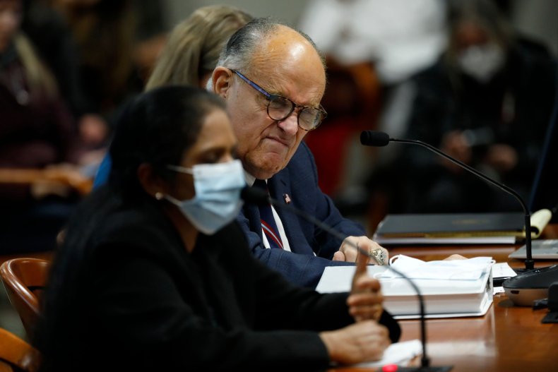 Rudy Giuliani Questions a Detroit Poll Worker