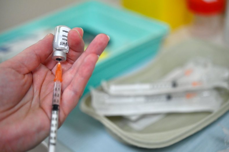 nurse prepares Pfizer-BioNTech COVID-19 vaccine