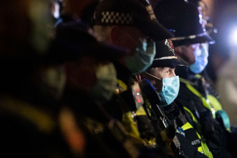 Police officers form a line in Wales