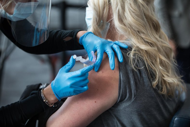 Woman receives COVID-19 vaccine in Massachusetts