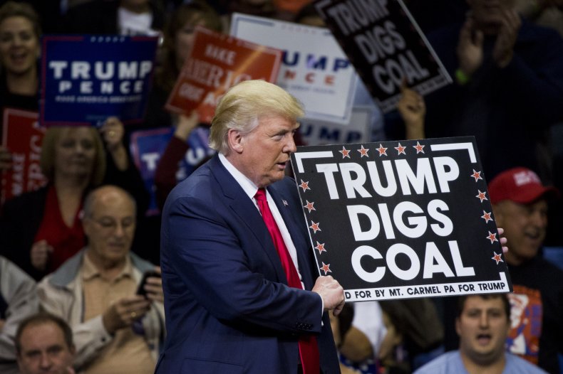 Trump with coal sign