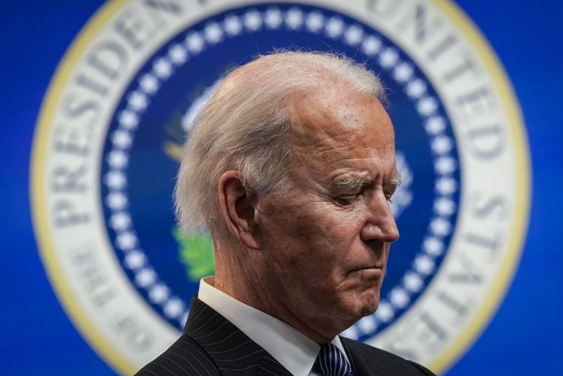 Joe Biden pictured after signing manufacturing EO