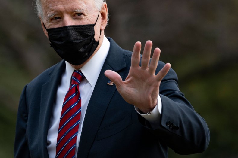 Joe Biden waves on White House arrival