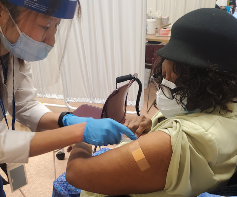 Tonya Russell's grandmother gets vaccinated